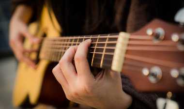 a person playing guitar