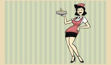 A waitress holds a pie in one hand with her other hand resting on her waist.