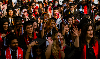 Graduating students celebrate during Commencement.