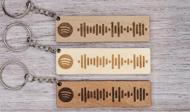 3 keychains with laser engraved Spotify scannable links