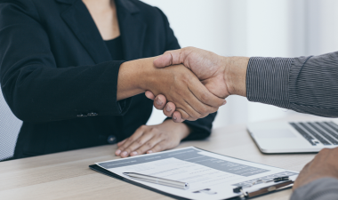 Two people shaking hands