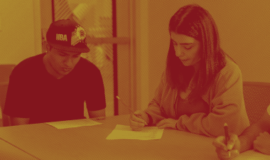 Students studying at a table