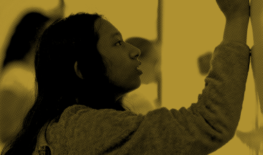 Graphic showing a student writing on a whiteboard.