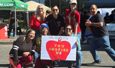 Faculty member Donnieau Snyder with supporters at the Over the Edge fundraiser.