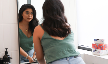 person in front of a mirror