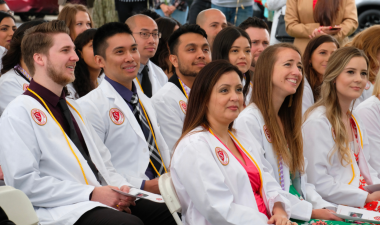 A crowd of Stan State nursing students sat at a conference
