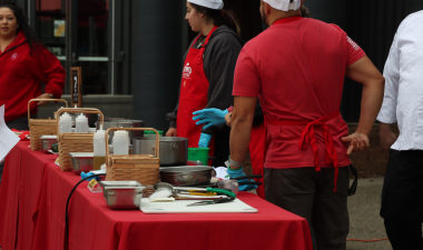 Community members cooking a meal