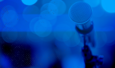 Microphone with blue background.