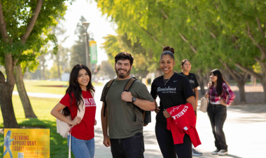 Three Stan State students posing for a photo.