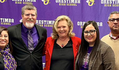 President Britt Rios-Ellis and officials from Orestimba High School at the MOU signing gathered in a photo
