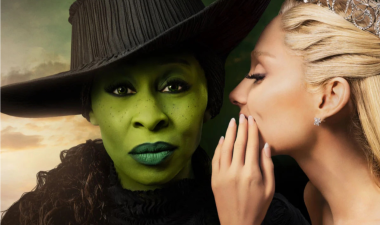 Woman whispering into another's ear, from the movie Wicked