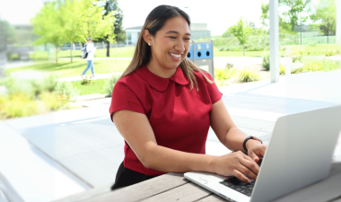 Person typing on computer