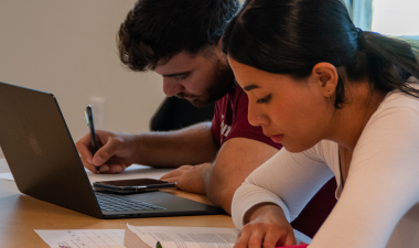 Two students studying indoors.