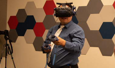 A person uses technology in the Warrior Fab Lab