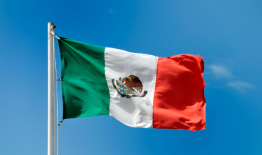 Mexican flag waving on a pole