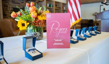 Rogers Scholars program book and recipient rings.