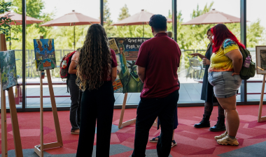 Students at an art exhibit