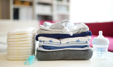 Baby clothing, diapers, and bottles