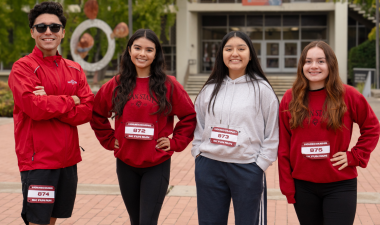 Four student participants from the Homecoming 5k in 2025 are seen in a group photo