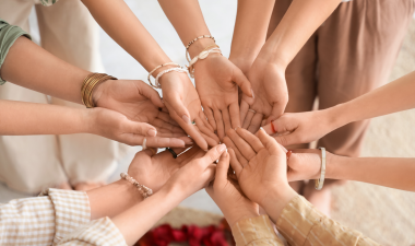 Women holding hands
