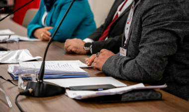 boardroom of people at a meeting