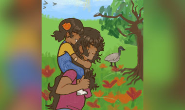 Woman carrying a child on her shoulders in a field