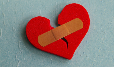 broken heart with band aid