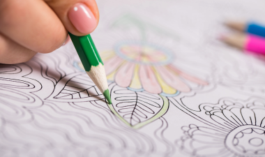 Person coloring a mandala