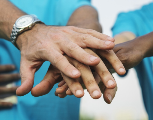 male hands in a support group