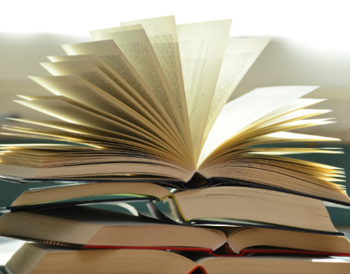 books stacked on top of each other