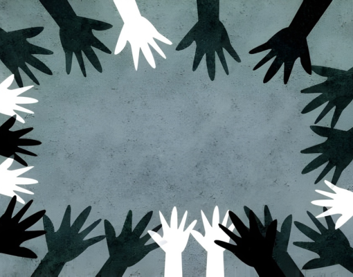 Hands of different skin tones forming a circle