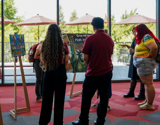 Students at an art exhibit