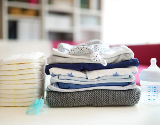 Baby clothing, diapers, and bottles