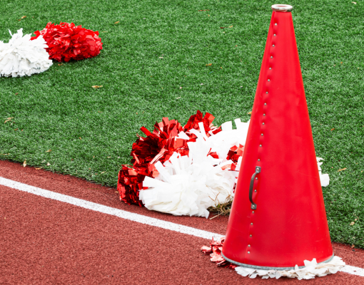 Cheer pompoms and speaker