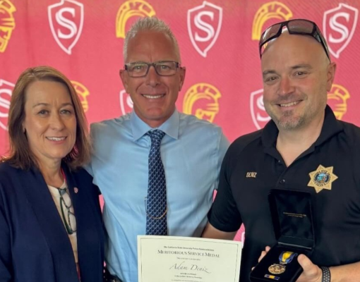 Left to right: VP Rose McAuliffe, Police Chief Steve Olson and Lieutenant Adam Deniz
