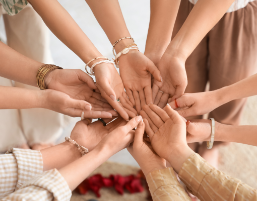 Women holding hands