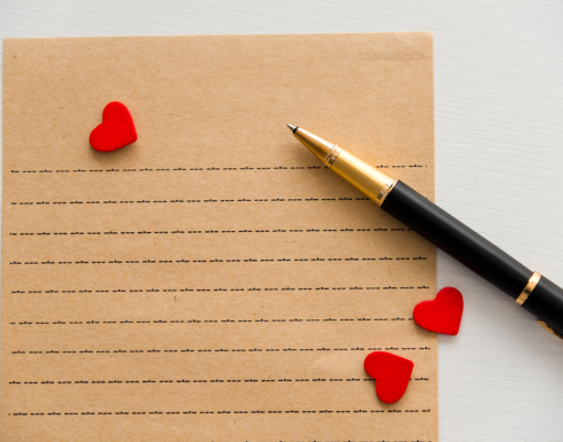 A lined piece of paper and a pen