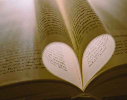 Book pages folded into a heart