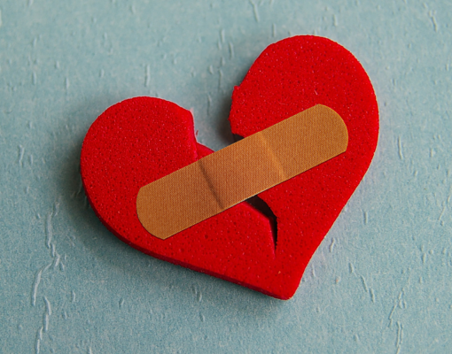 broken heart with band aid