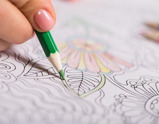Person coloring a mandala