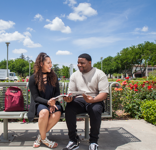 students near rose garden