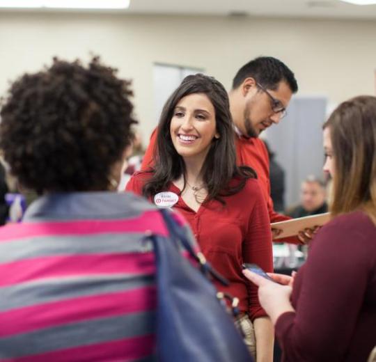 Target representative speaking with potential employees.
