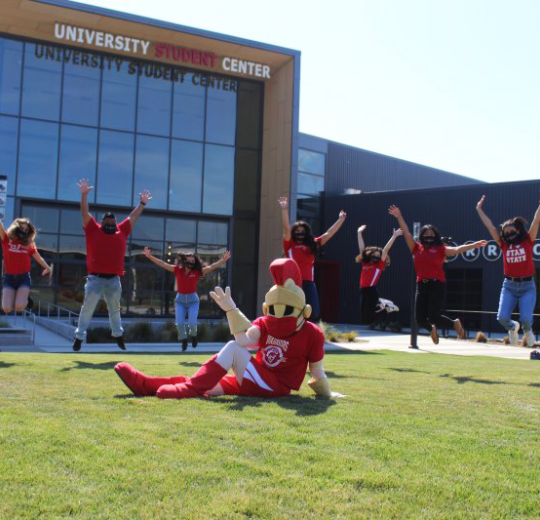 Titus (University mascot) with group of students