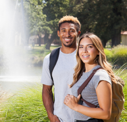 Two students in group photo.