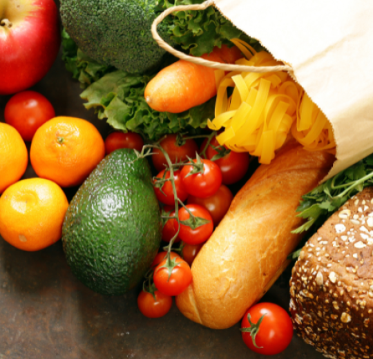 Various produce is laid on a countertop.