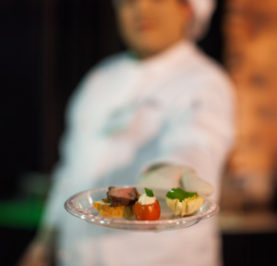 Chef holding a plate