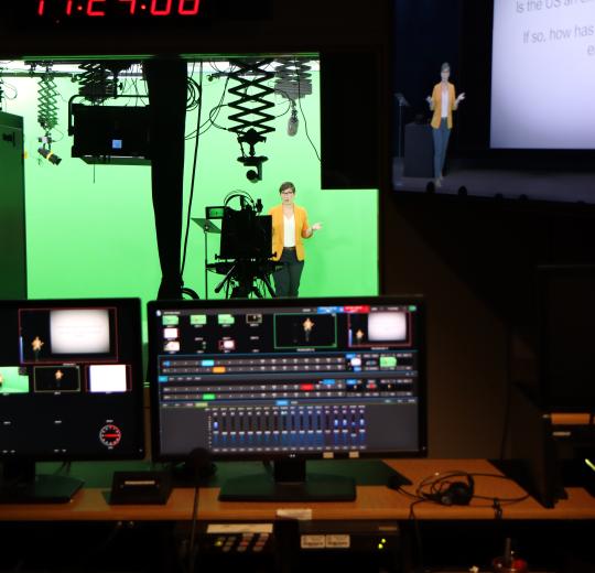 Dr Black using the studio green screen