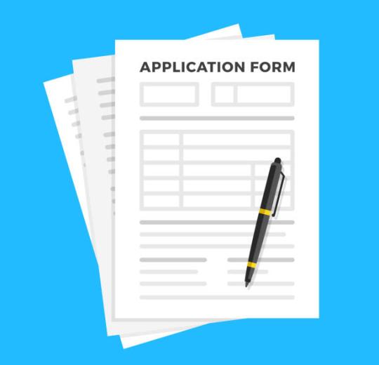 picture of a paper application and pen