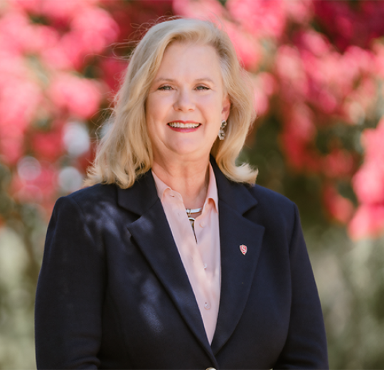 President Britt Rios-Ellis