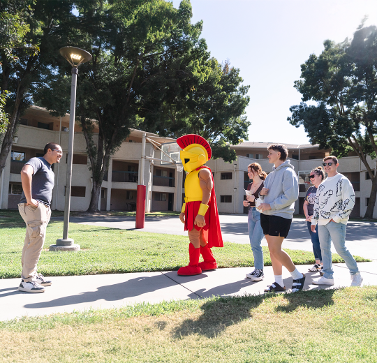 Titus on housing tour with future warriors
